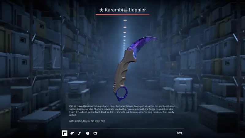 Karambit | Doppler Sapphire Skin mit leuchtend blauer Klinge, auf schwarzem Hintergrund